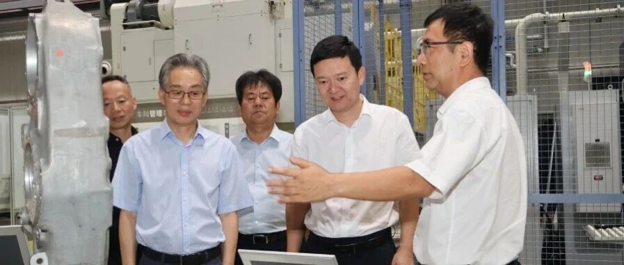 新昌县领导一行调研日发精机